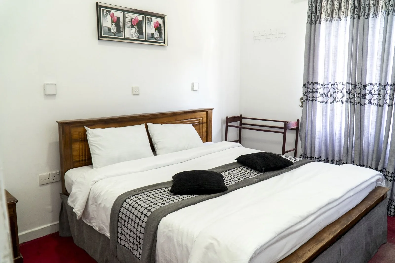 A bright twin bedroom with natural light