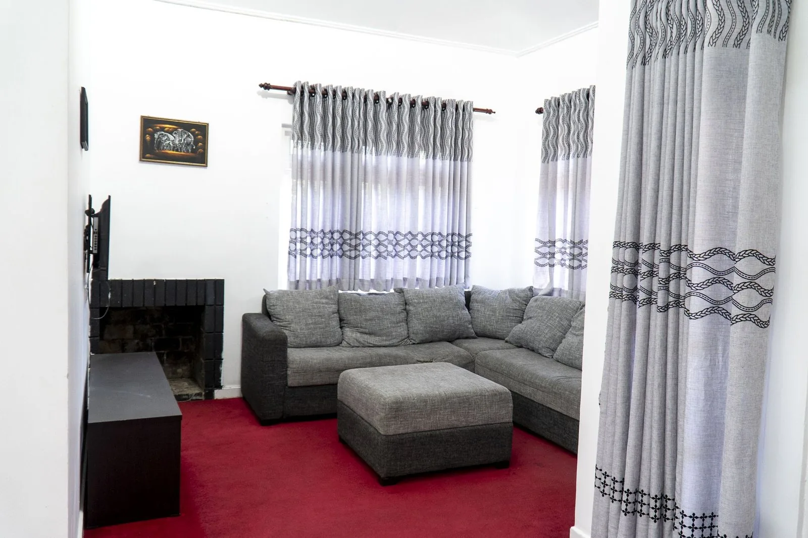 The lounge, with sofas and timber furnishings